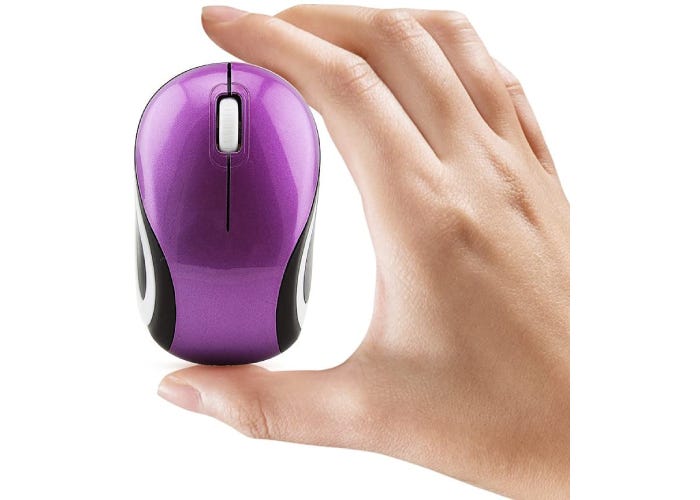 hand holding up a pink-purple wireless laptop mouse with black and white accents