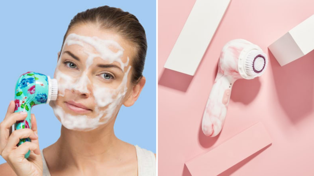 a woman uses a brush to cleanse her face.