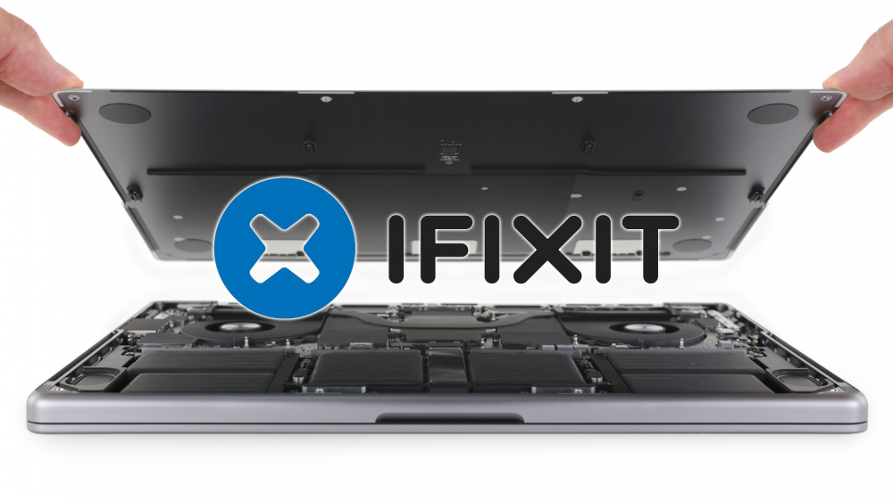 An open MacBook Pro 14-inch (2021 model) with the iFixit logo.