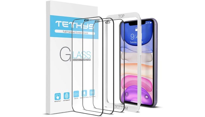 A screen protector displayed near an iPhone. 