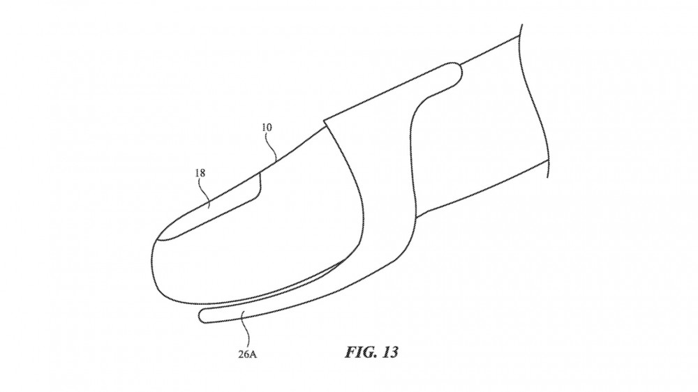 A drawing from an Apple patent showing a finger harness for wireless keyboard