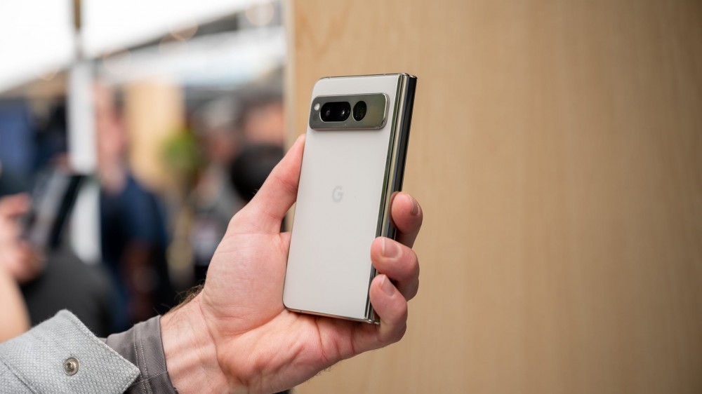 Person holding the back of the Google Pixel Fold with the screen closed